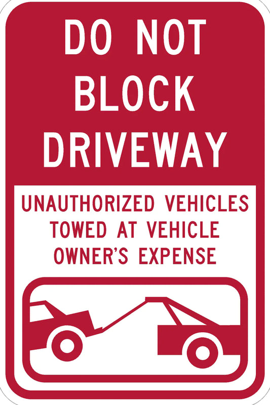 "Do Not Block Driveway, Unauthorized Vehicles Will...."